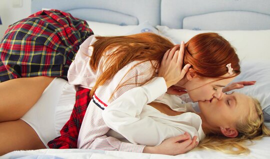 Redhead student lifted her skirt and gave pussy to a lesbian friend